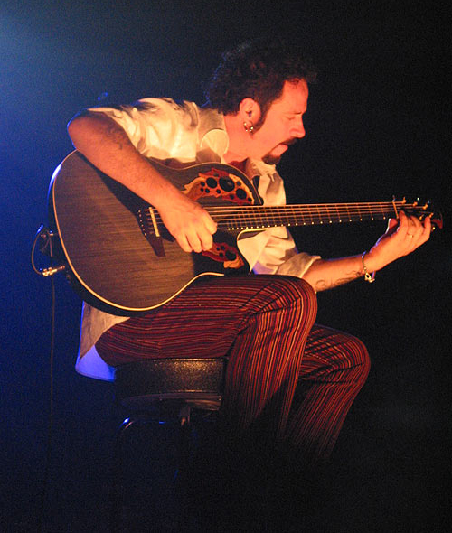 Toto guitarist Steve Lukather with an Adamas model Ovation acoustic guitar. 