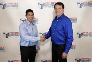 David Heller, president of Printex Packaging Corporation, and David Dennison, president of Transparent Packaging, seal the deal.