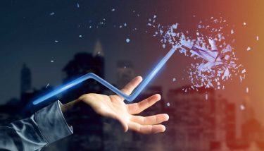 Bad Management - UK Productivity Puzzle - View of a Businessman holding a Financial arrow going up and explosing at the end - image courtesy of Depositphotos.