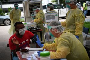 A total of 384 new cases are migrant workers staying in dormitories.