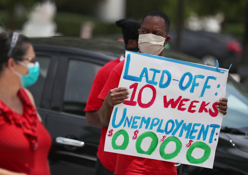 A protest asking Florida to fix its unemployment system