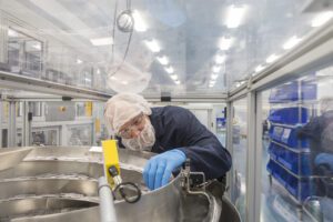 A Web Industries worker in a medical device lab